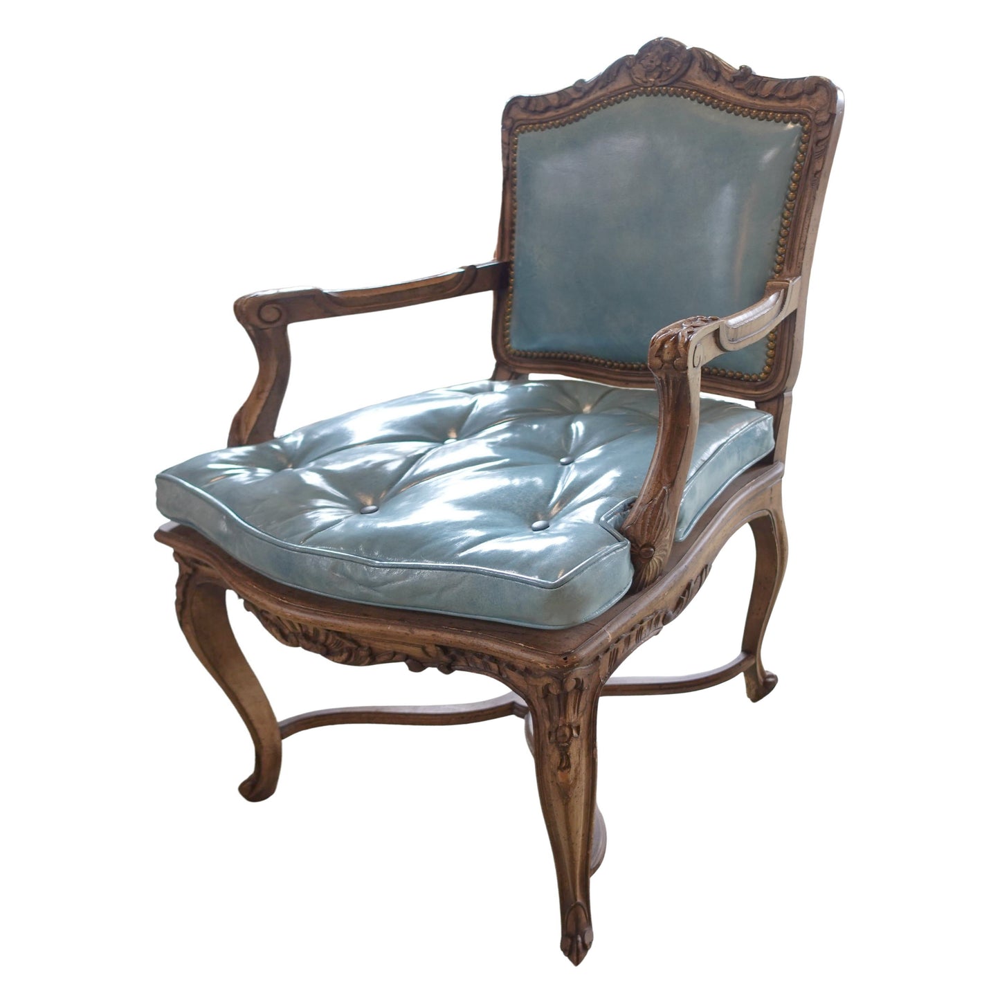 Vintage chair with light blue cushion on a white background