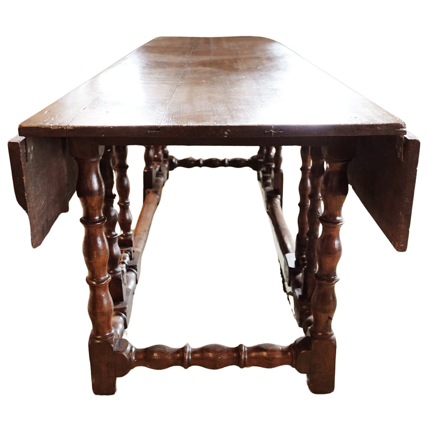 Wooden drop-leaf table with a white background
