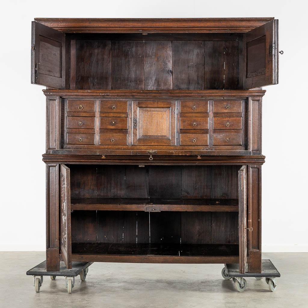 Distinctive early 18th century Dutch Oak Geometric Kussen Cabinet with integral Secretairiat