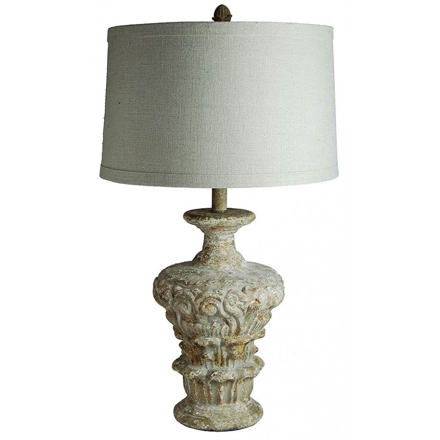 Provence Home - A distressed and natural toned grey and gold finished carved wooden table lamp in the manner of an antique capital or urn