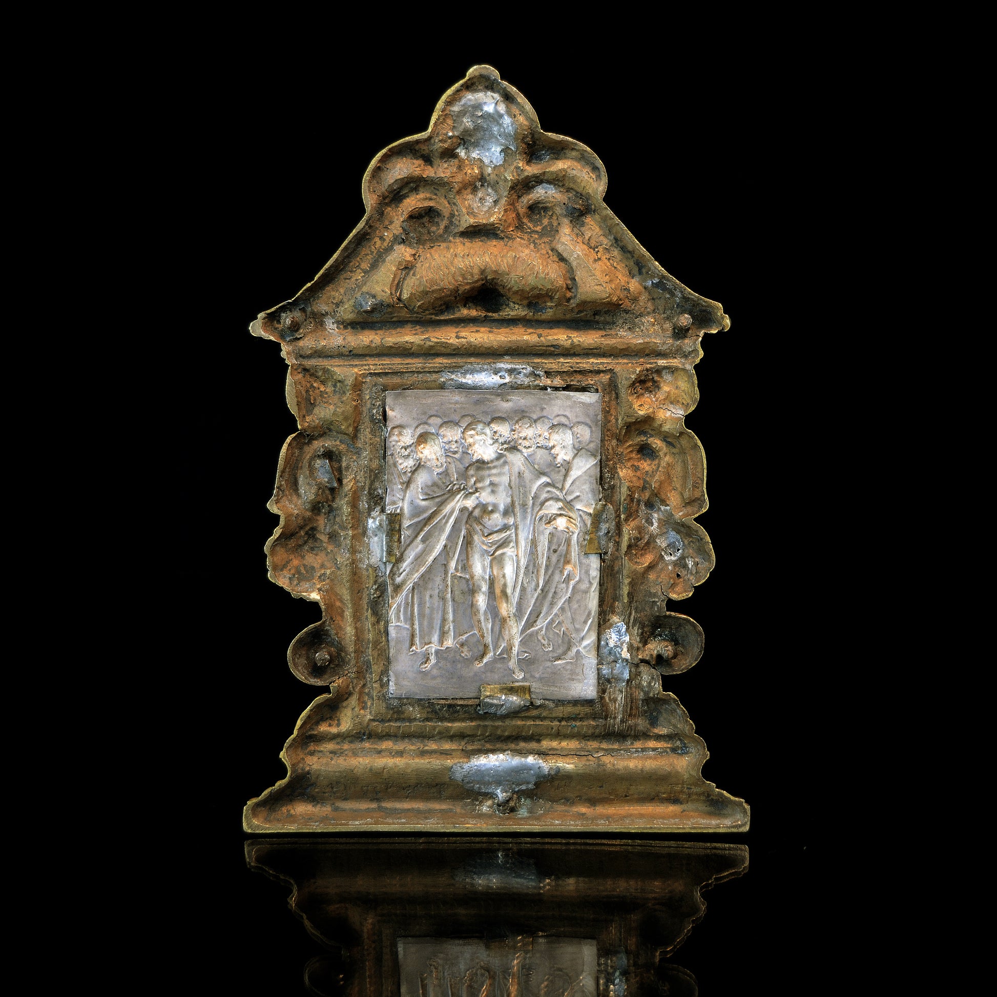 A silver and gilt bronze pax by Antonio Gentili of Doubting Thomas