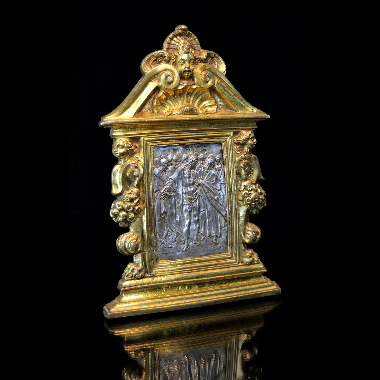 A silver and gilt bronze pax by Antonio Gentili of Doubting Thomas