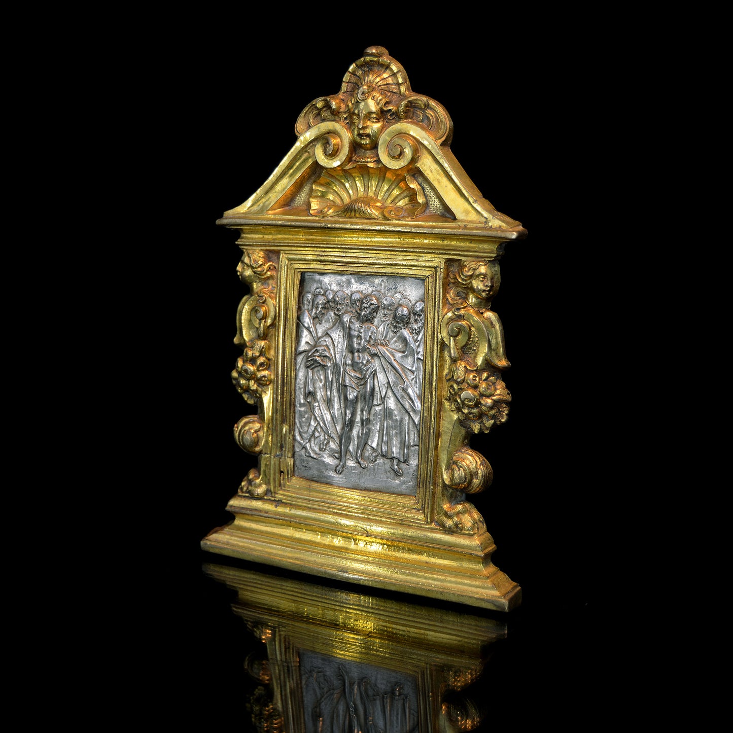 A silver and gilt bronze pax by Antonio Gentili of Doubting Thomas