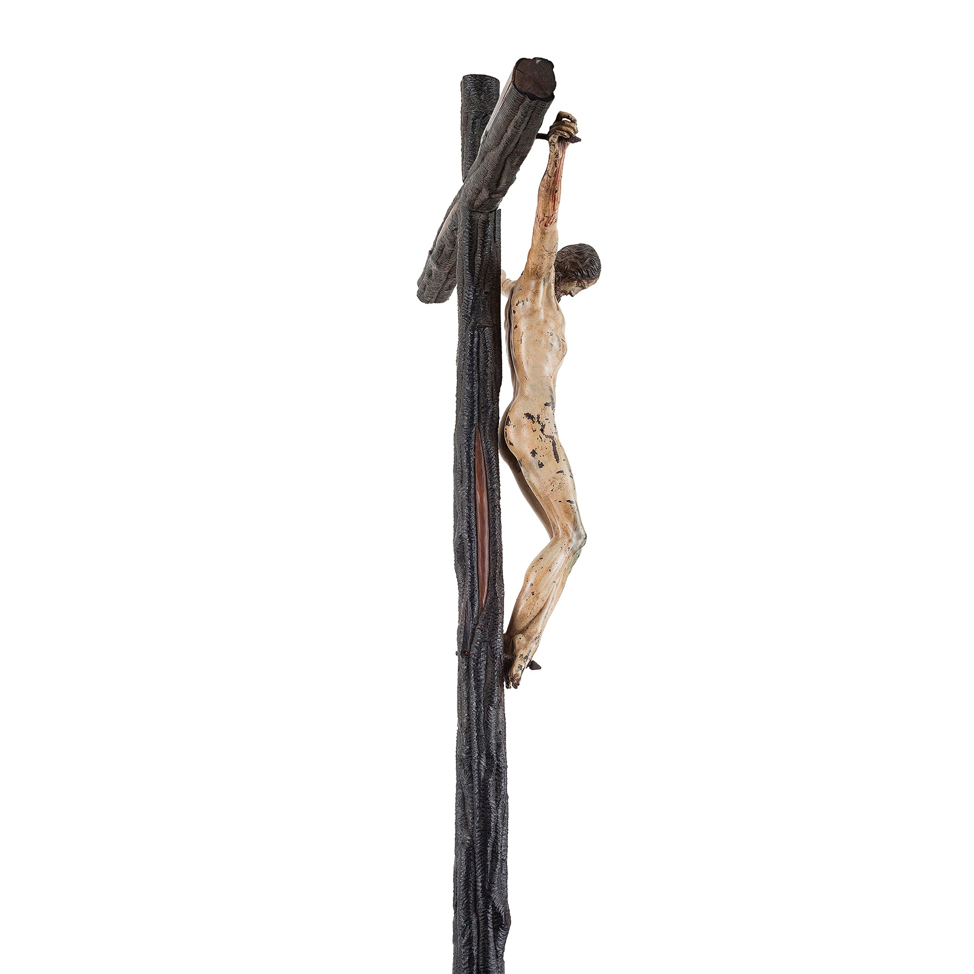 A Rare and Important Painted Bronze Crucifix, after a model by Michelangelo Buonarotti