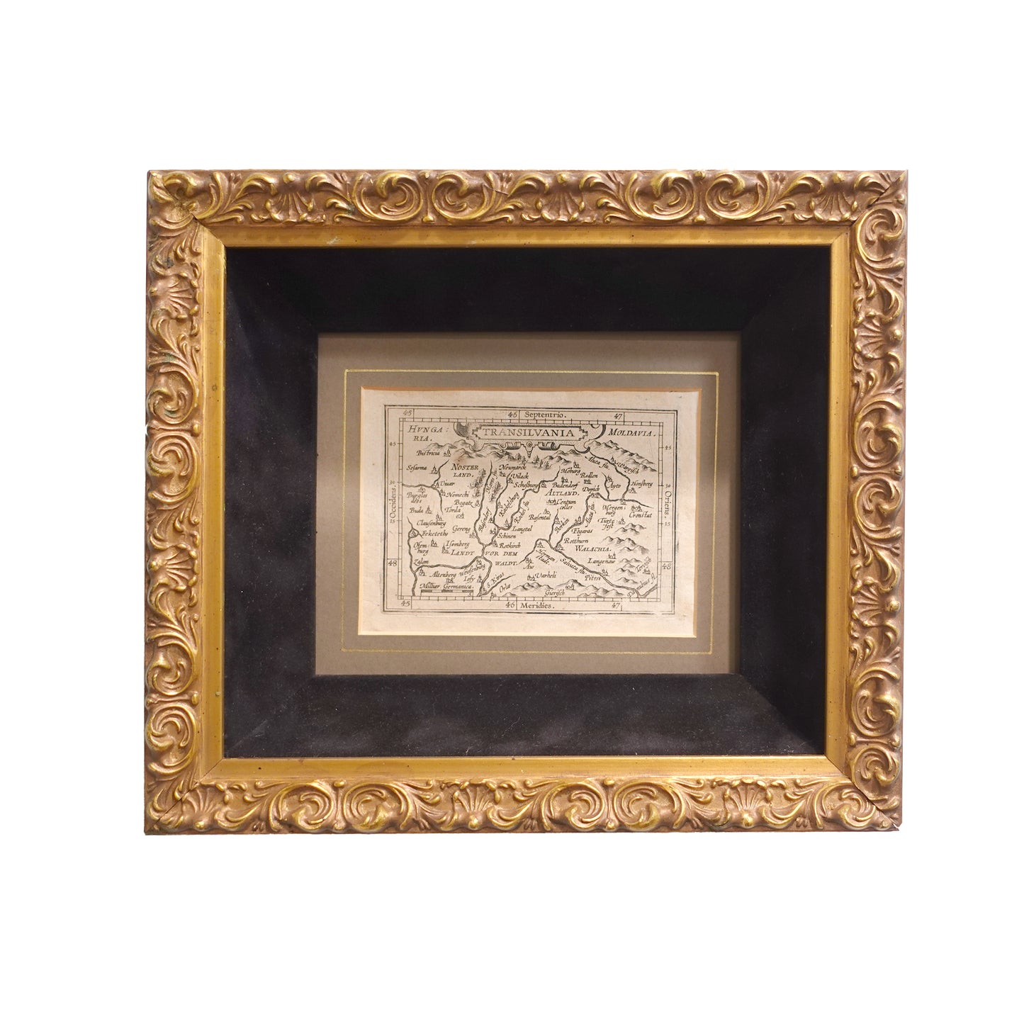 An antique map of Transylvania framed in a gothic gilt and black velvet frame