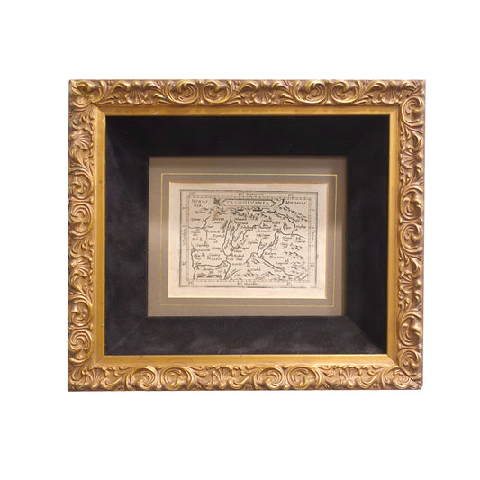An antique map of Transylvania framed in a gothic gilt and black velvet frame