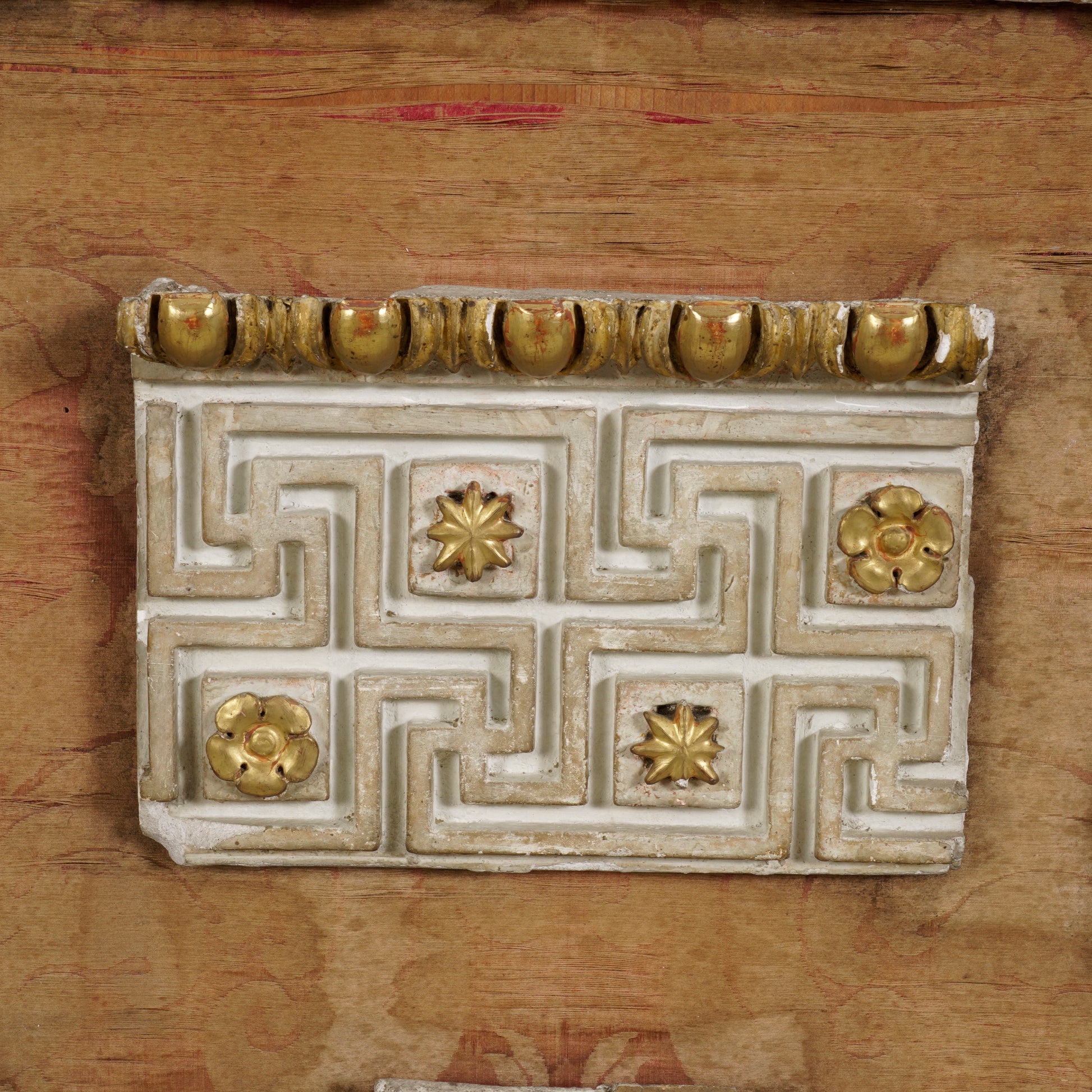 Plaster detail of a Greek meander pattern plaster mold architectural fragment