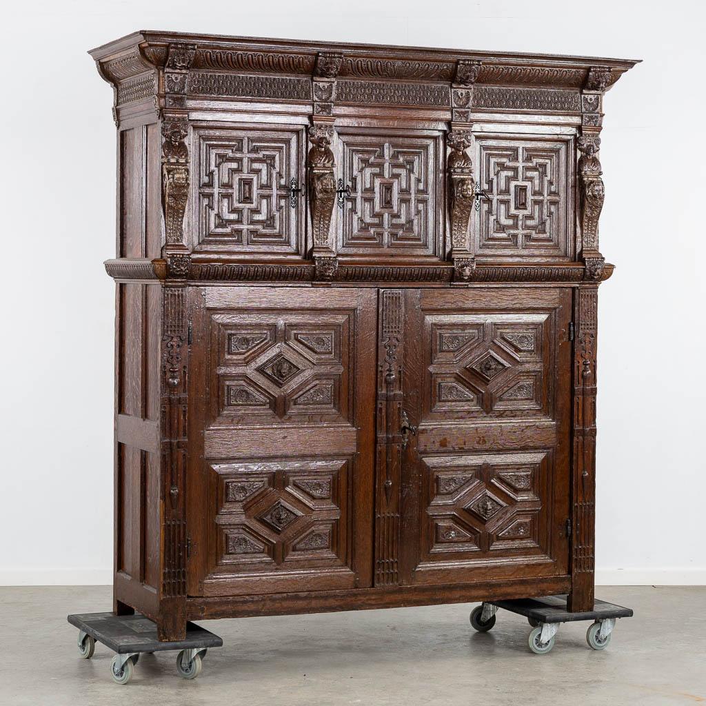 Monumental 17th century Richly Ornamented and Coffered Flemish Oak Cabinet