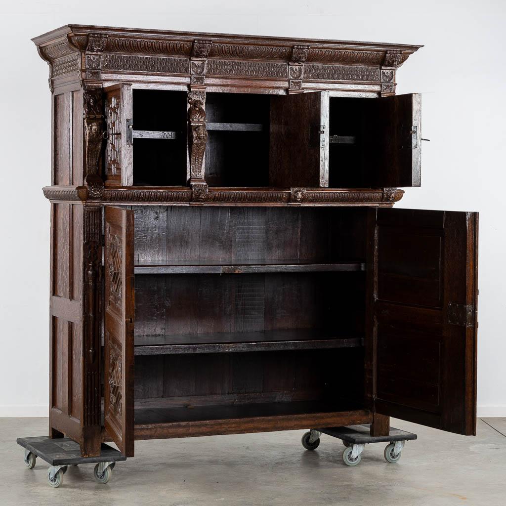 Monumental 17th century Richly Ornamented and Coffered Flemish Oak Cabinet