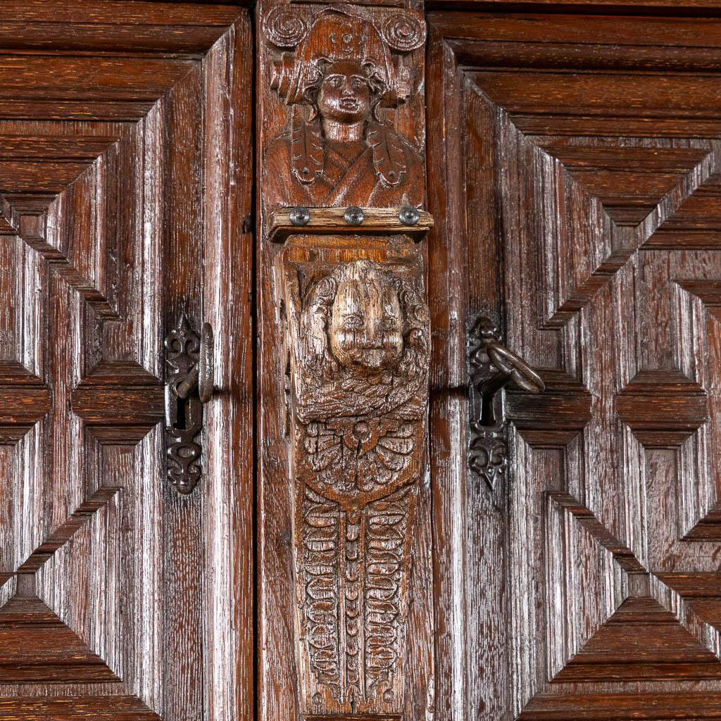 Monumental 17th century Richly Ornamented and Coffered Flemish Oak Cabinet