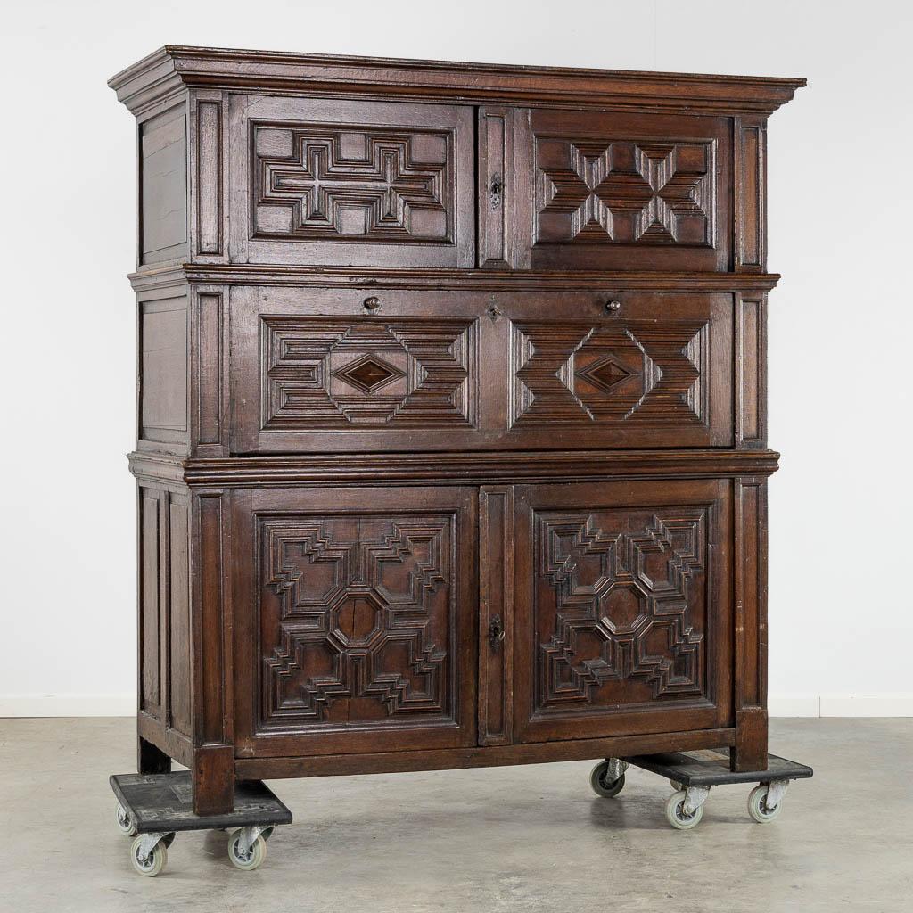 Distinctive early 18th century Dutch Oak Geometric Kussen Cabinet with integral Secretairiat