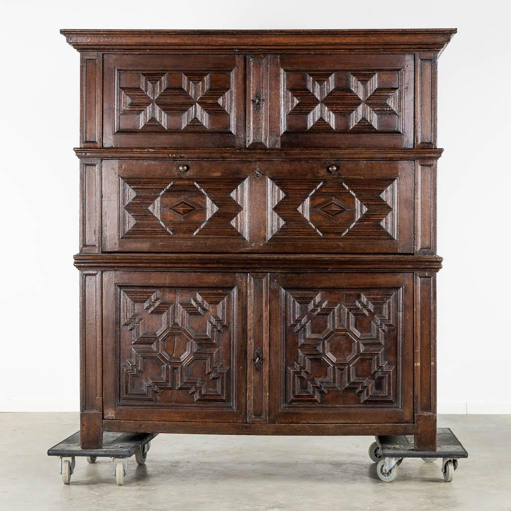 Distinctive early 18th century Dutch Oak Geometric Kussen Cabinet with integral Secretairiat