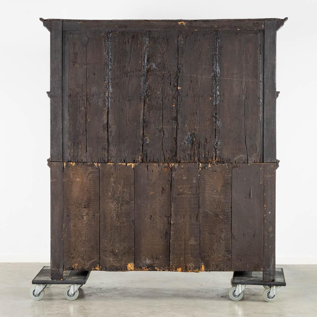 Distinctive early 18th century Dutch Oak Geometric Kussen Cabinet with integral Secretairiat