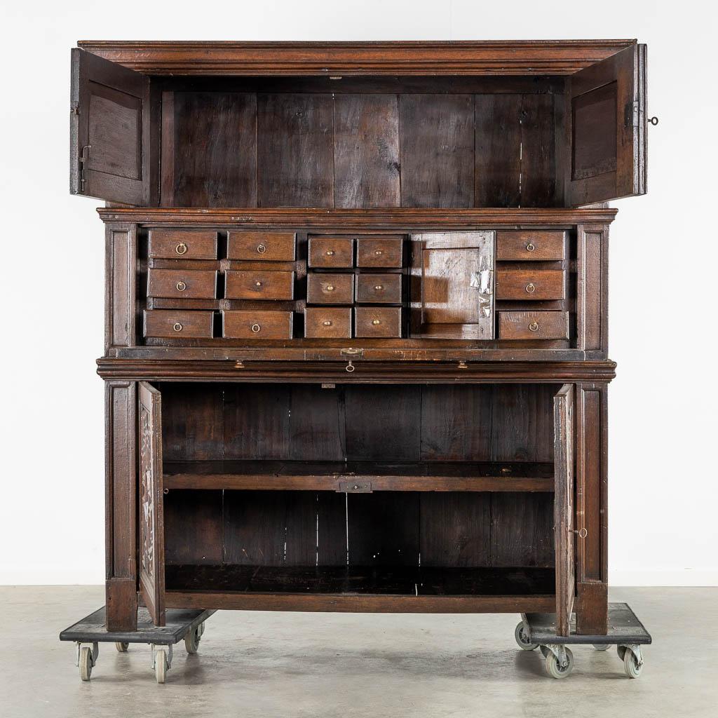 Distinctive early 18th century Dutch Oak Geometric Kussen Cabinet with integral Secretairiat