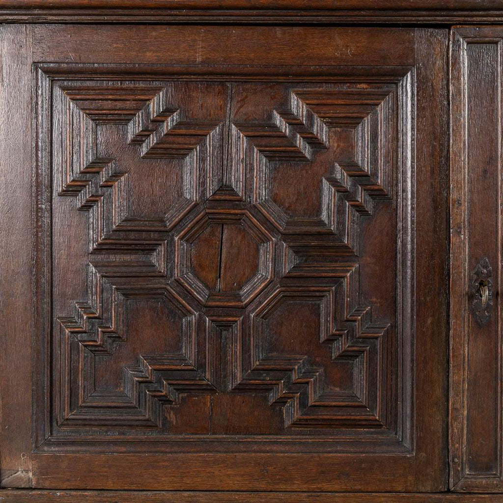 Distinctive early 18th century Dutch Oak Geometric Kussen Cabinet with integral Secretairiat