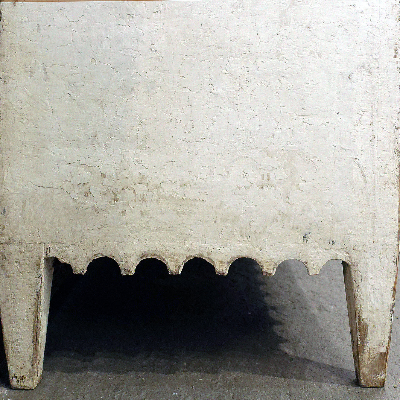 Scalloped skirting on an antique Gustavian dresser from the 19th century